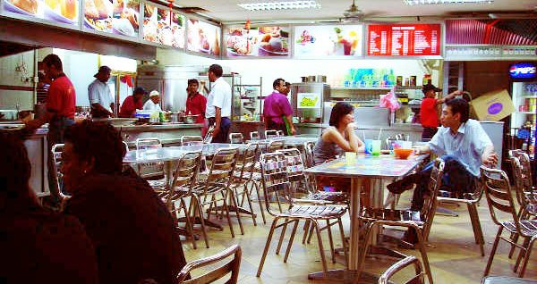 A typical scene at a 'mamak' stall in KL. Usually, if you don't find plastic tables and chairs, there would usually be metal tables and chairs placed in the restaurant or stall.
