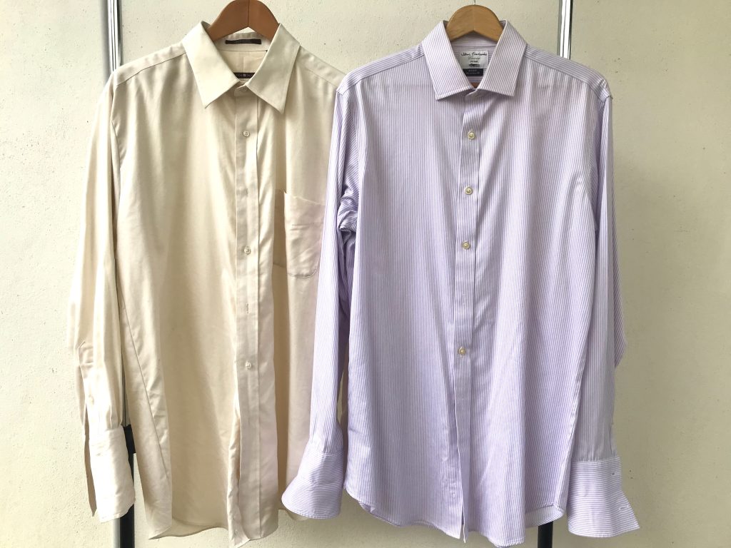 Two dress shirts, pastel yellow and narrow striped white and lavender. These are the two intermediate level shirts.