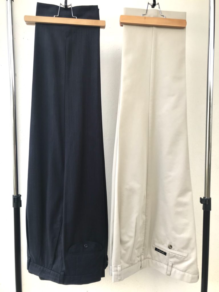 Two dress trousers, navy blue and beige. An intermediate addition to the basics.