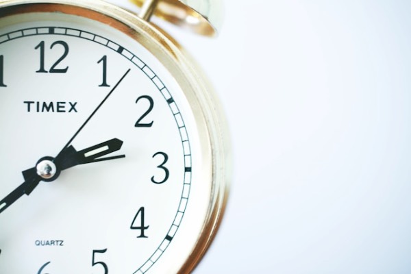 Close up of a table clock, symbolising the nature of time.